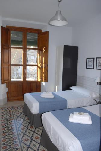Pension La Perla Granada Suites