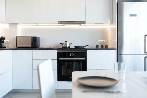 Hauzify I Apartaments Winds