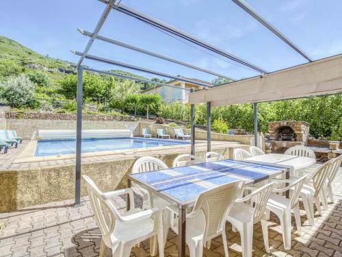 Alluring Holiday Home In Roquebrun With Swimming Pool