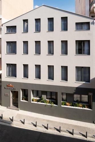 Apartamento Thess Residences