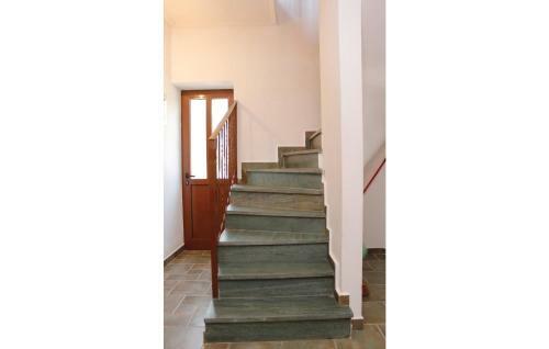 Two-bedroom Holiday Home In Andreas Paralio