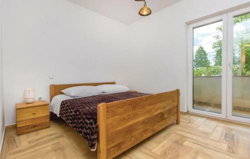 Four-bedroom Holiday Home In Miljevci