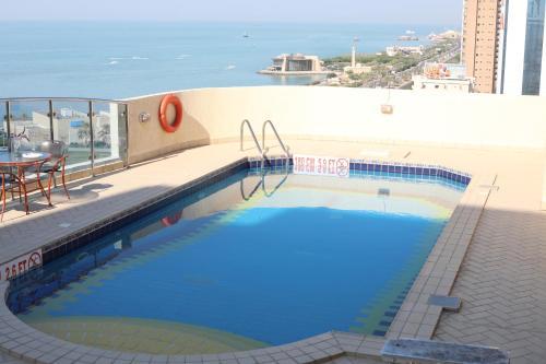 Corniche Suites Hotel