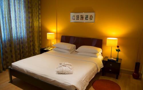 Corniche Suites Hotel