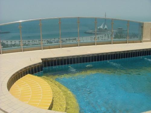 Corniche Suites Hotel