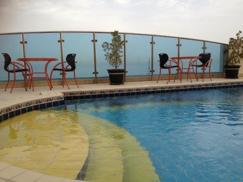 Corniche Suites Hotel