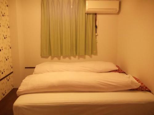 Albergue Backpackers Hotel Toyo