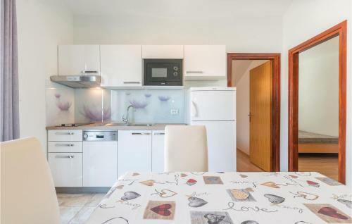 Two-bedroom Apartment In Povljana