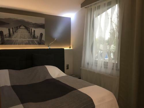 Hostal Calypso Lakeside Rooms & Lux Apartments
