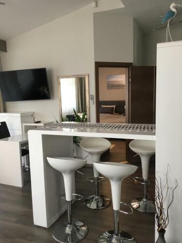 Hostal Calypso Lakeside Rooms & Lux Apartments