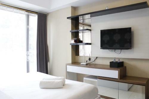 Minimalist Studio Room @ Beverly Dago Apartment By Travelio