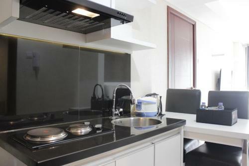 Comfy Studio Apartment At Tamansari Tera Residence By Travelio