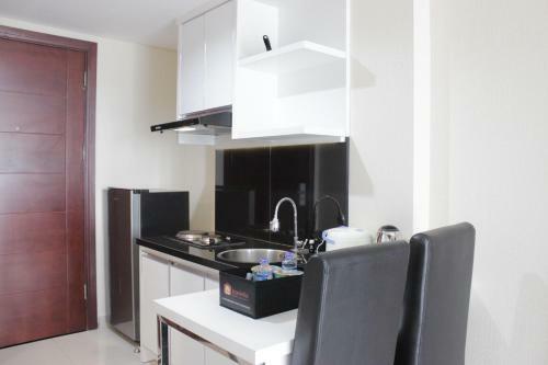 Comfy Studio Apartment At Tamansari Tera Residence By Travelio