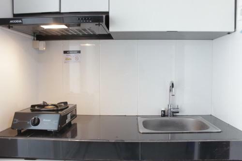 Artistic 1br Apartment At Gateway Pasteur Near Exit Toll Pasteur By Travelio
