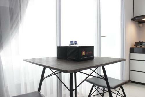 Artistic 1br Apartment At Gateway Pasteur Near Exit Toll Pasteur By Travelio