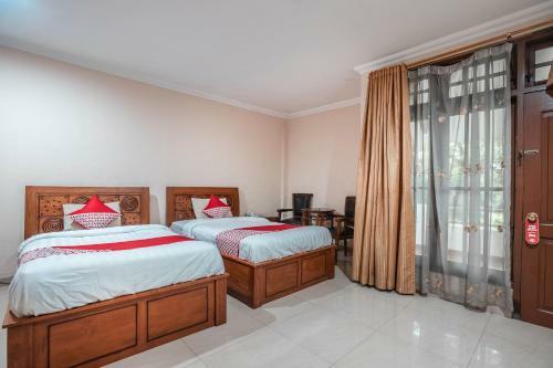 Oyo 686 Bunga Karang Hotel