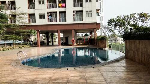 Simple Studio Apartment At Serpong Greenview By Travelio