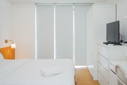Relax And Comfy @ Studio Casa de Parco Apartment By Travelio