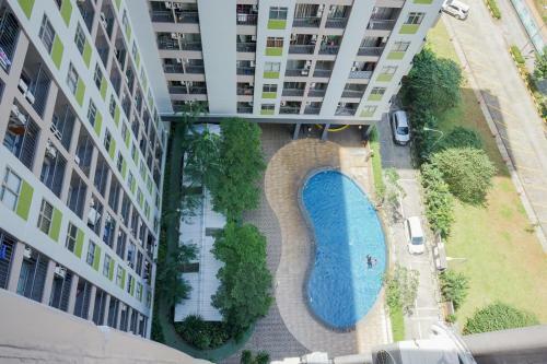 Modern Comfy 2br Serpong Greenview Apartment By Travelio