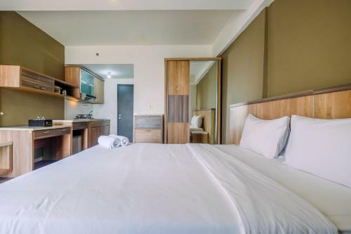 Modern And Cozy Studio Park View Apartment By Travelio