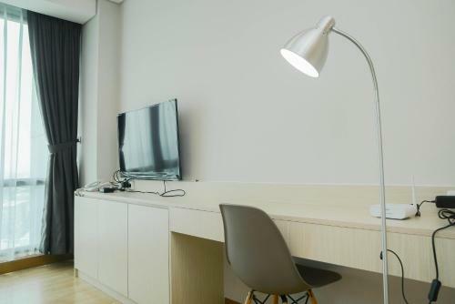 Comfortable Studio Room At Capitol Suites Apartment By Travelio