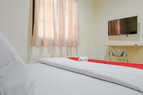 Hostal Reddoorz @ Jalan Biak Roxy Jakarta