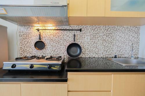 Cozy Studio At Tamansari Semanggi Apartment By Travelio