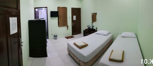 Hostal Embe Pitoe Syariah Gejayan