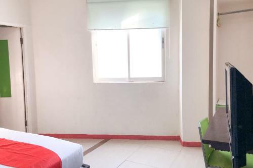 Hotel Reddoorz Near Pantai Pede