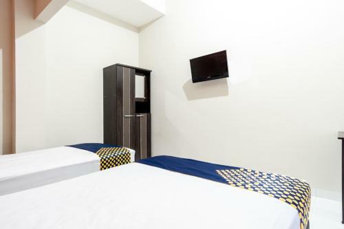 Hotel Spot On 2272 Citra Arcade Residence Syariah