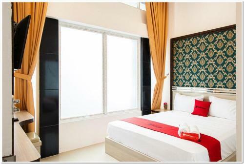 Hostal Reddoorz Plus @ Centrium Katamso Medan