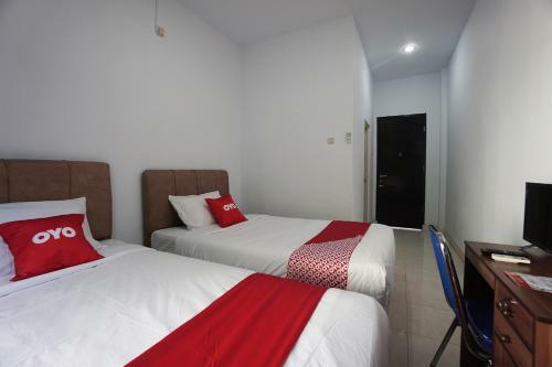 Hotel Oyo 2566 Putri Kesia Rooms