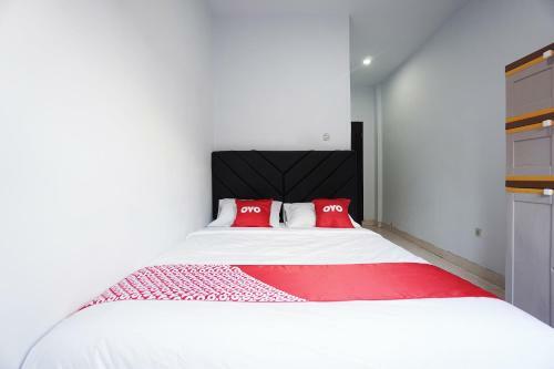 Hotel Oyo 2566 Putri Kesia Rooms