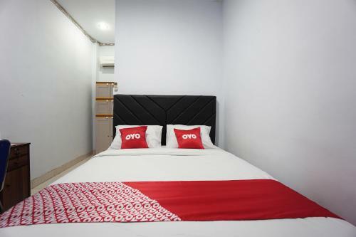Hotel Oyo 2566 Putri Kesia Rooms
