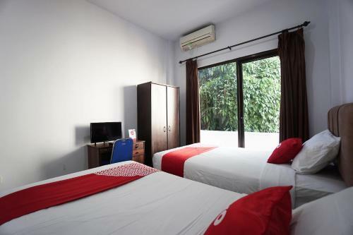 Hotel Oyo 2566 Putri Kesia Rooms
