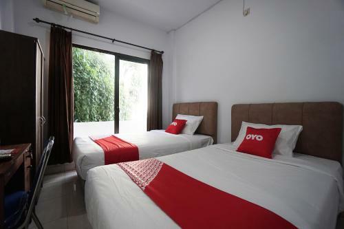 Hotel Oyo 2566 Putri Kesia Rooms