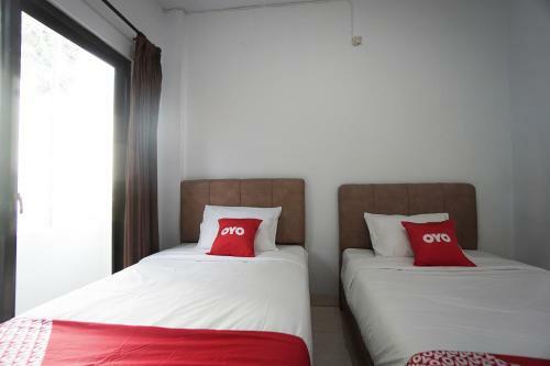 Hotel Oyo 2566 Putri Kesia Rooms
