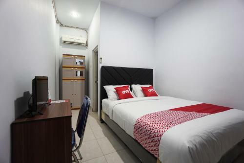 Hotel Oyo 2566 Putri Kesia Rooms