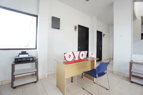 Hotel Oyo 2566 Putri Kesia Rooms