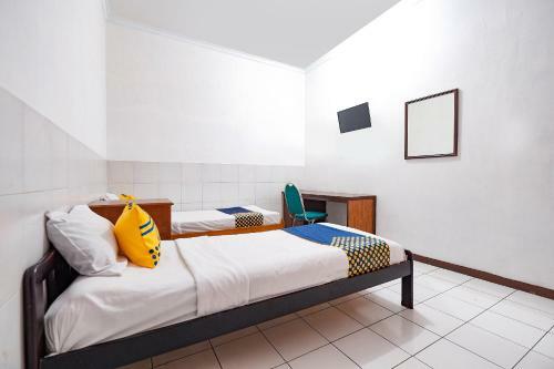 Hotel Spot On 2865 Sartika Inn Pati