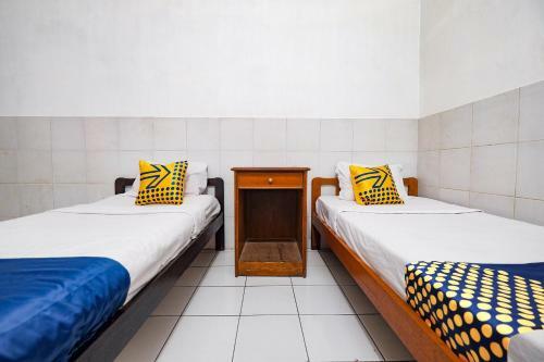 Hotel Spot On 2865 Sartika Inn Pati