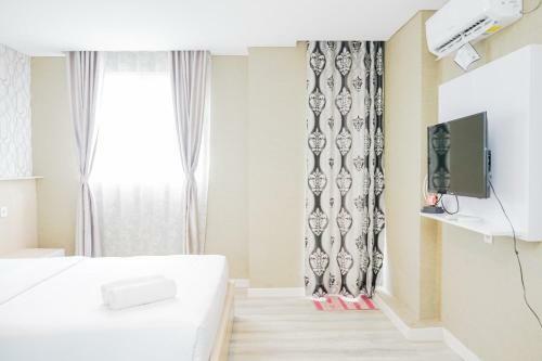 Spacious And Compact Studio Room At Bintaro Icon Apartment By Travelio