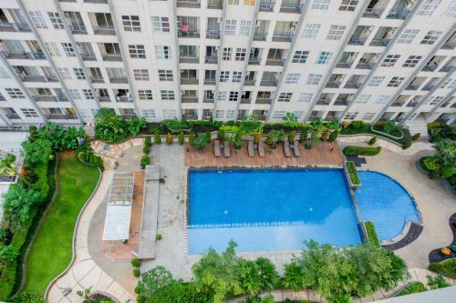 Cozy 1br Unit Saveria Apartment By Travelio