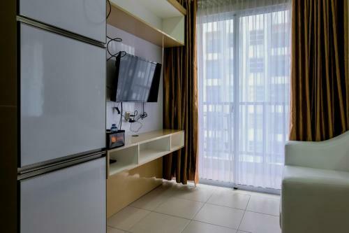 Cozy 1br Unit Saveria Apartment By Travelio