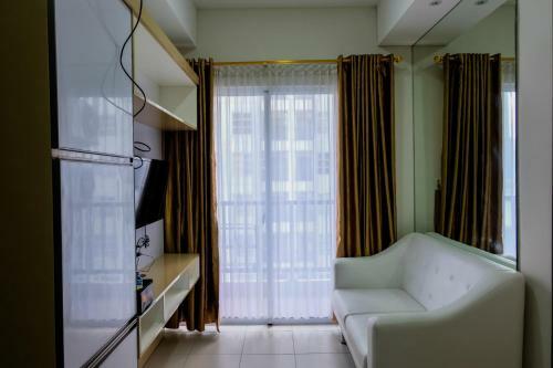 Cozy 1br Unit Saveria Apartment By Travelio