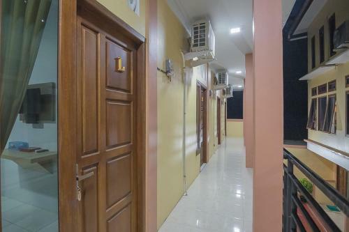 Hostal Reddoorz Near Rsud Dr. Abdul Aziz