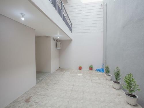Hostal Reddoorz Near Ciputra Golf Surabaya