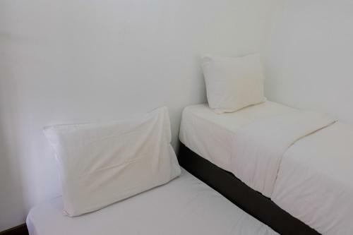 Minimalist 2br At Asatti Apartment By Travelio