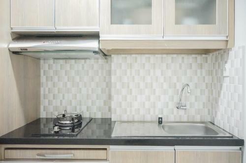 Comfy Studio At Trimezia Beverly Apartment By Travelio