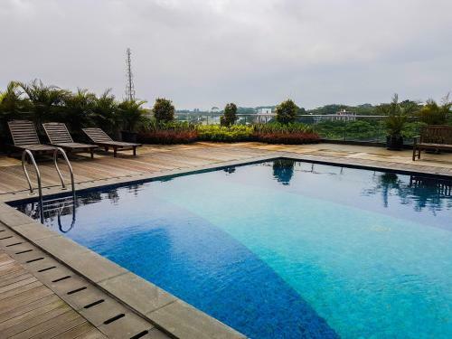 Tree Park Studio Apartment Near Ice Bsd By Travelio